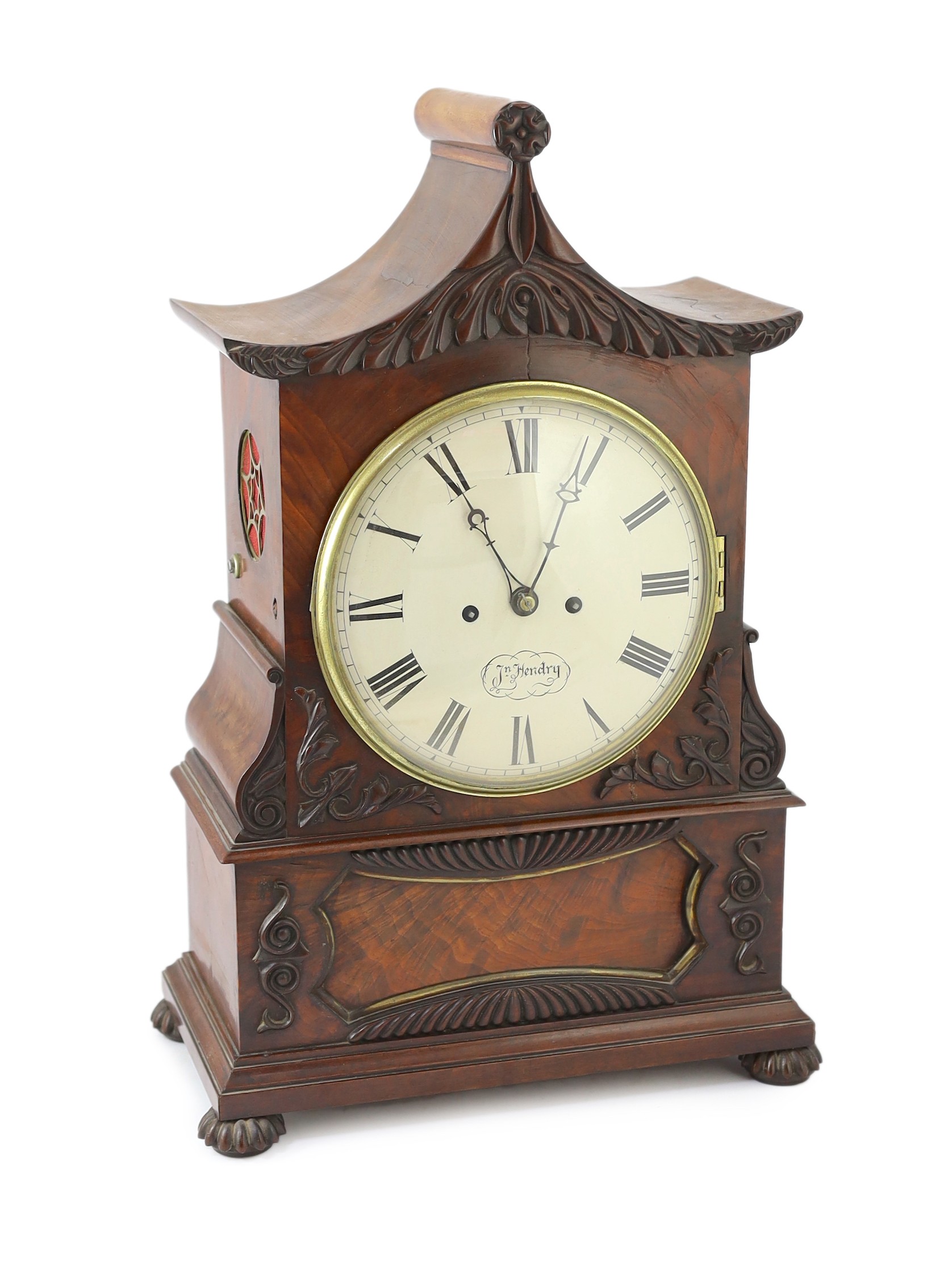 J. N. Hendry. A William IV carved mahogany pagoda top bracket clock, 36cm wide 20cm deep 54cm high